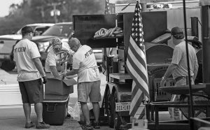 Barbecue pit masters prepare a free meal for those attending last year’s Heritage Day celebration in downtown Midlothian on Sept. 11, 2021. The Midlothian Downtown Business Association and the Midlothian Chamber of Commerce are joining forces to put on this year’s event on Saturday, with the backing of the Midlothian Community Development Corporation. Kirk Holt/ Mirror photojournalist