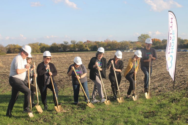 Leaders and staff from Hope Health break ground on the organization's new facility, which will be located at the southeast intersection of Coleman and Farley streets. Chris Roark/staff photo