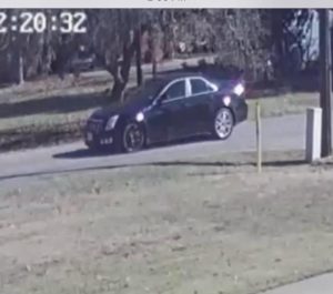 Italy police say the driver of this black Cadillac fired a shot at an Italy firefighter after an argument over speeding. Courtesy of the Italy Police Department